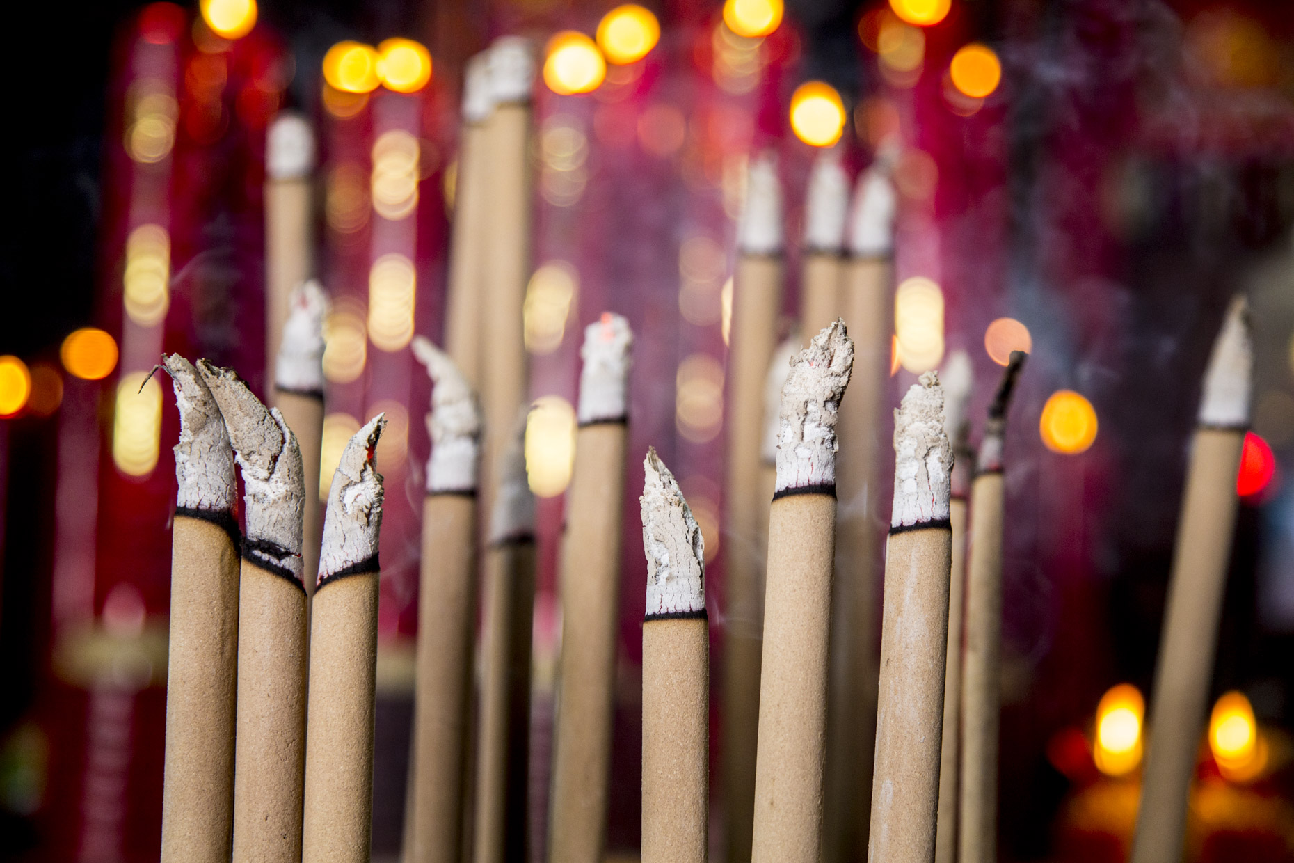 Burning incense in Malaysian Temple