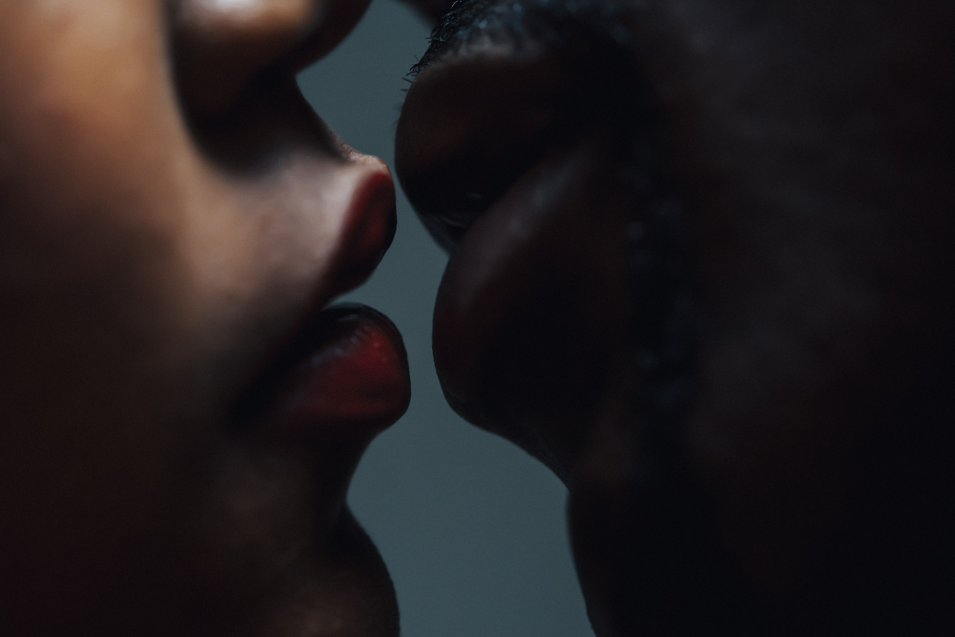 Close up of male and female lips almost kissing