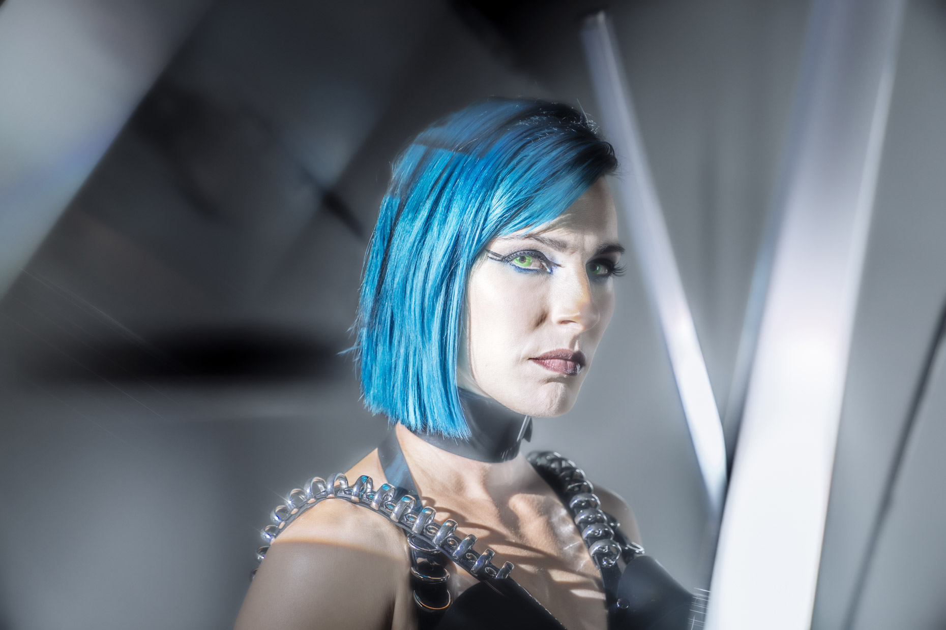 Portrait of cyber punk musician Le Destroy with blue hair
