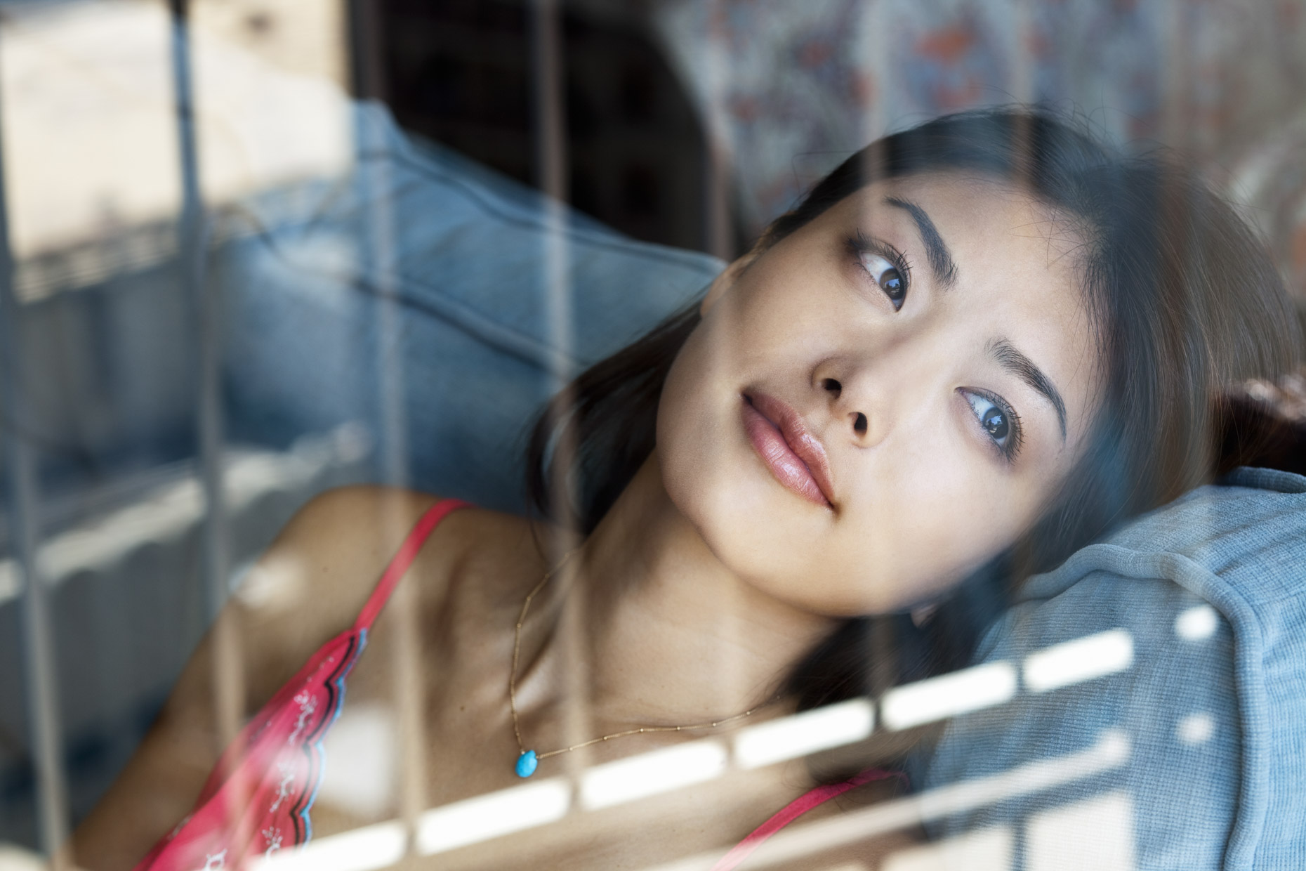 Portrait of Japanese woman looking out window