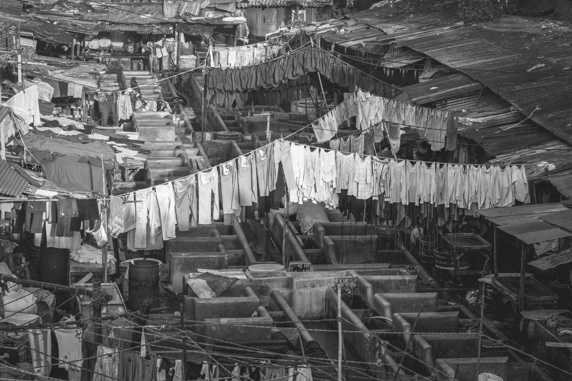 Rows of laundry hanging in slum in Mumbai