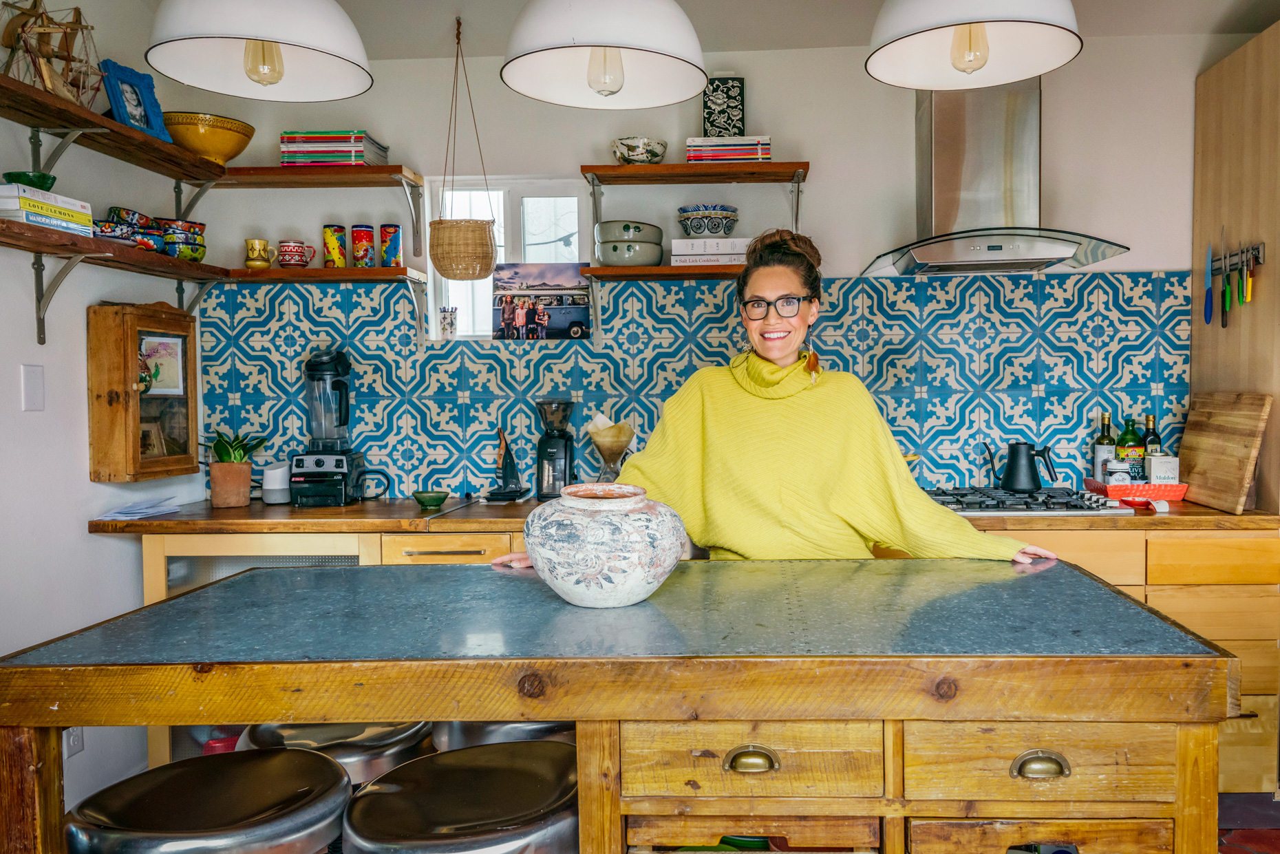 Smiling-women-in-yellow-sweater-standing-at-kitchen-counter-is20190306_Erinn_Sukha_0010