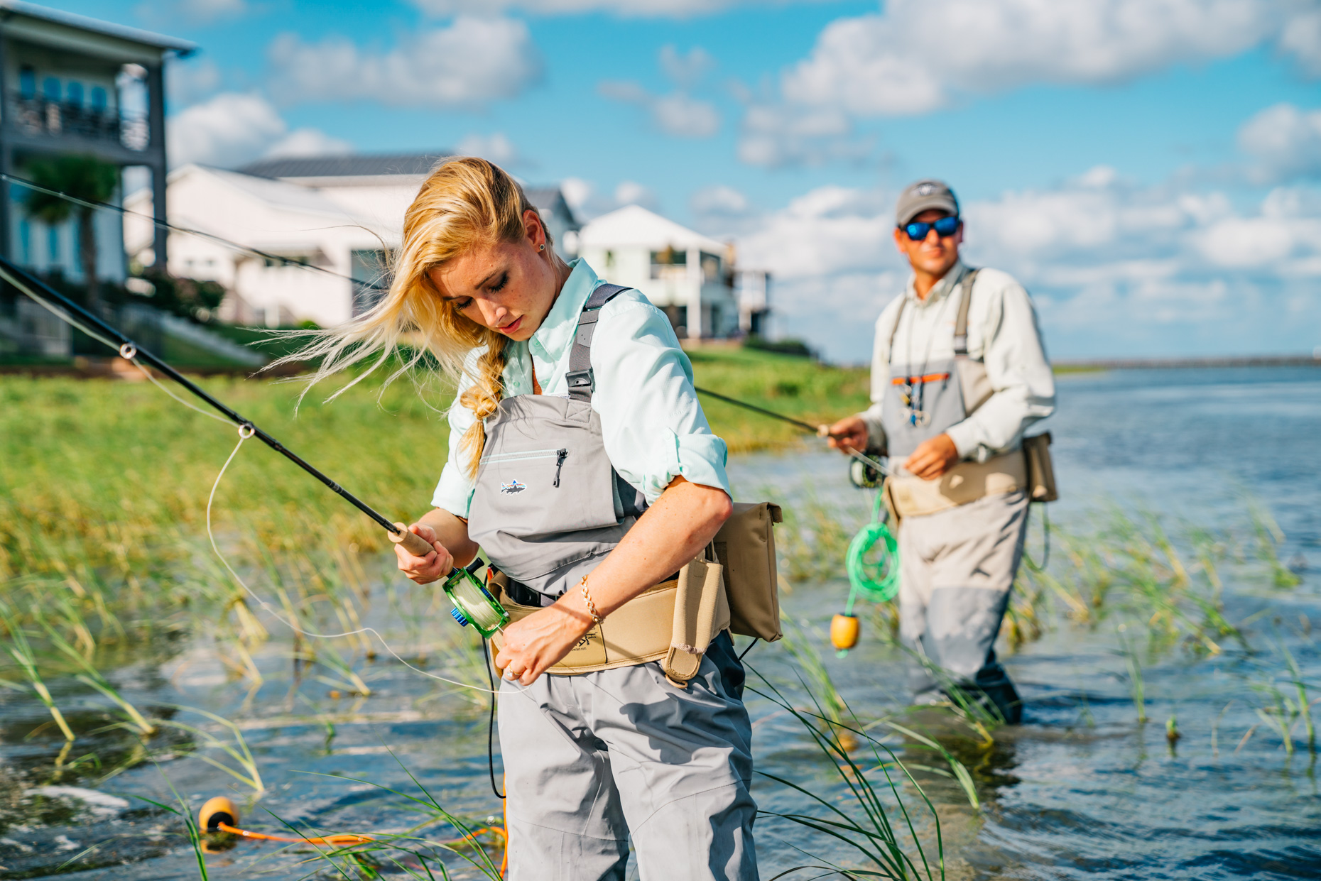 Woman-and-man-in-water-fly-fishing-is20190614_SCB_3040Inti-St-Clair-Austin-TX
