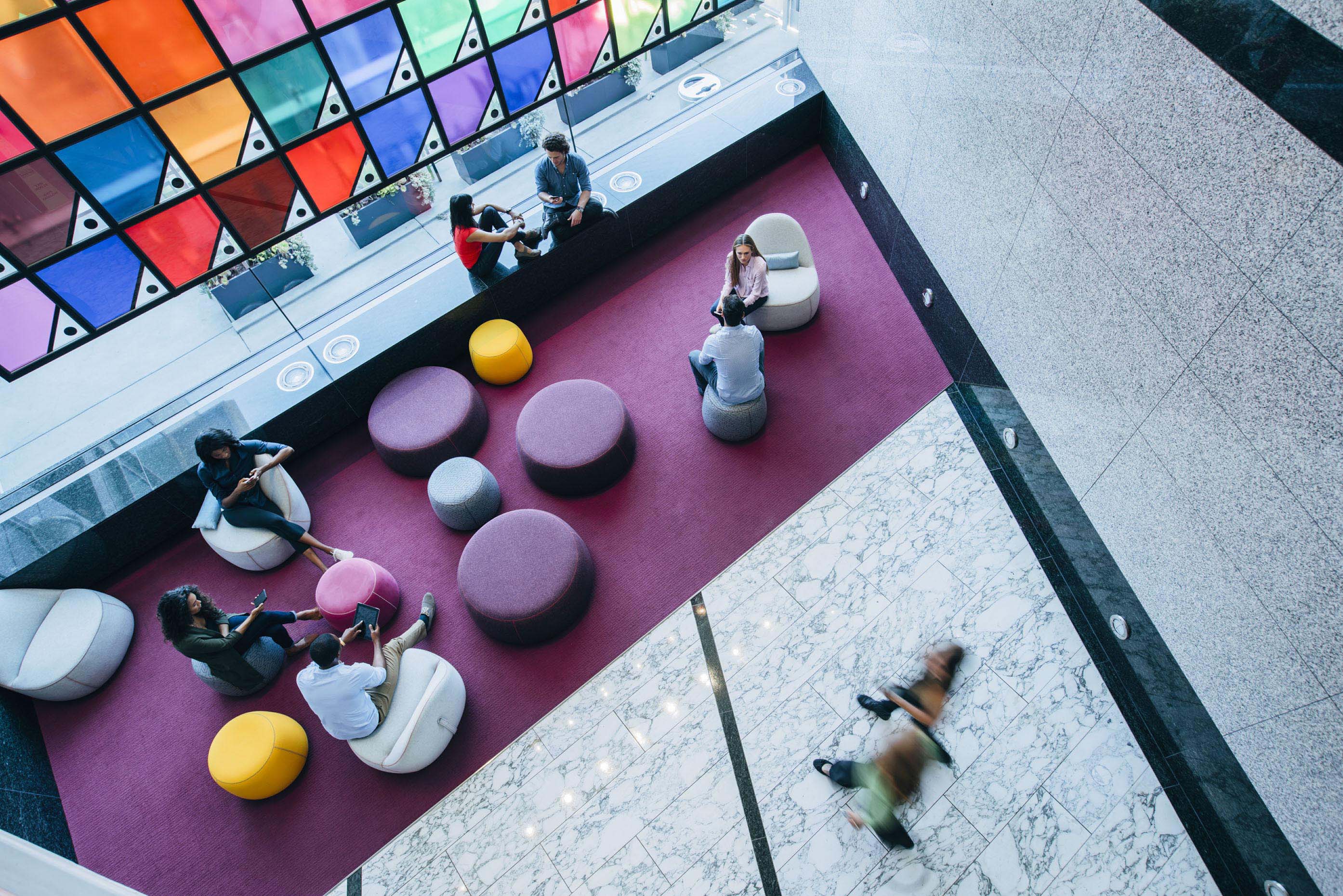 overhead-view-modern-bright-colorful-office-lobby-Inti-St-Clair-is201707224056